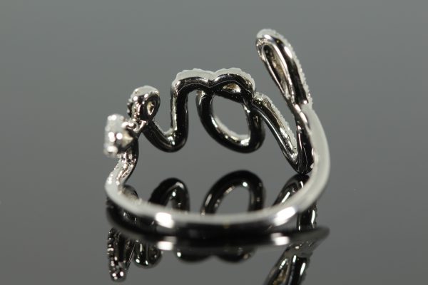 Diamond white gold cursive ring