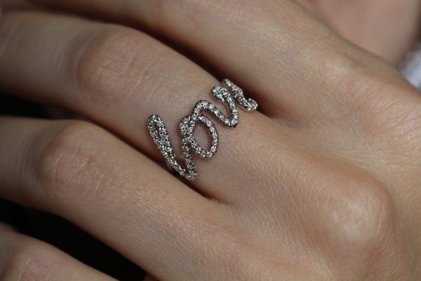 Diamond white gold cursive ring