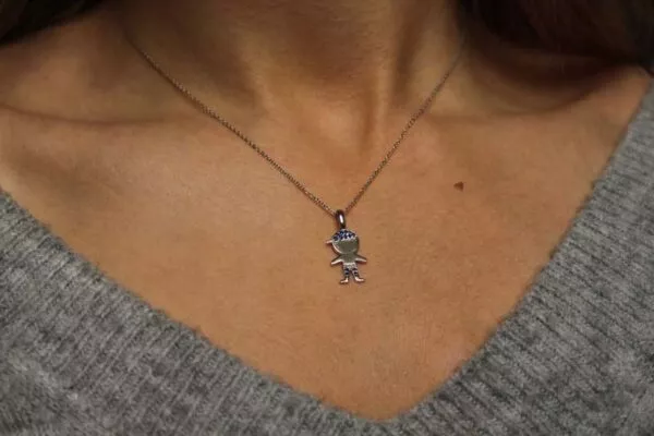 boy pendant on the neck