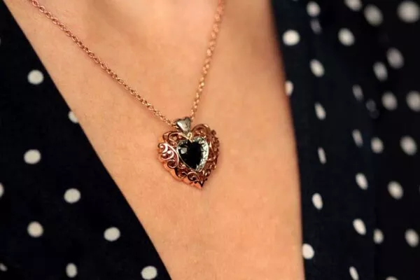 diamond heart necklace on neck