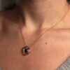 puffy heart necklace on neck